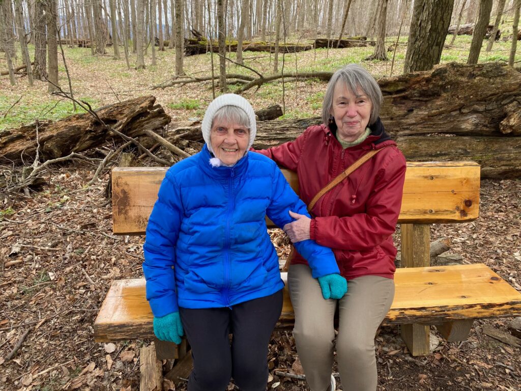 2 elderly ladies on bench